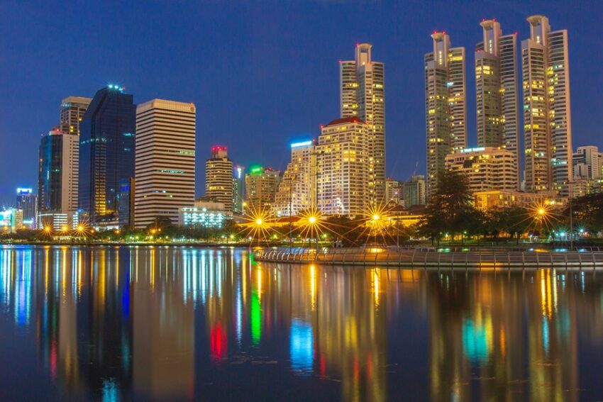 Luxury condos in Bangkok skyline at night